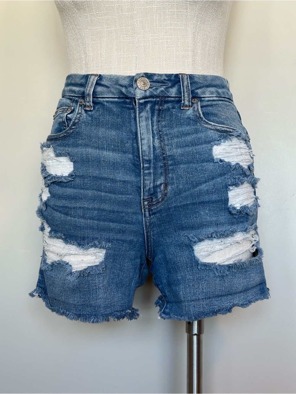 American Eagle Next Level Stretch Curvy High-Rise Shortie Distressed Shorts